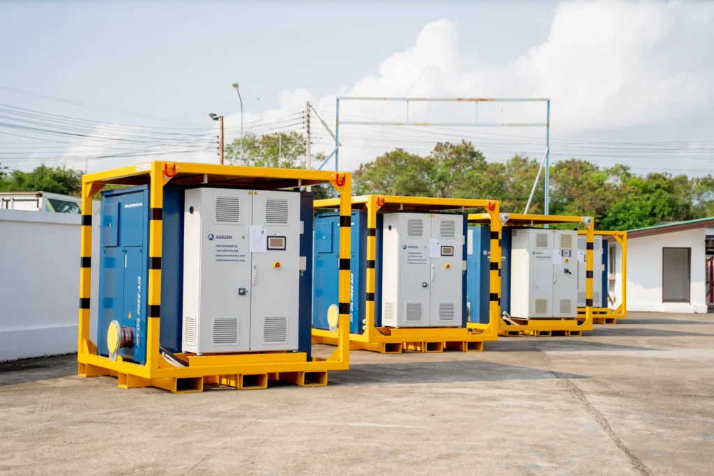 Multiple industrial blower rental units ready for deployment at factory site