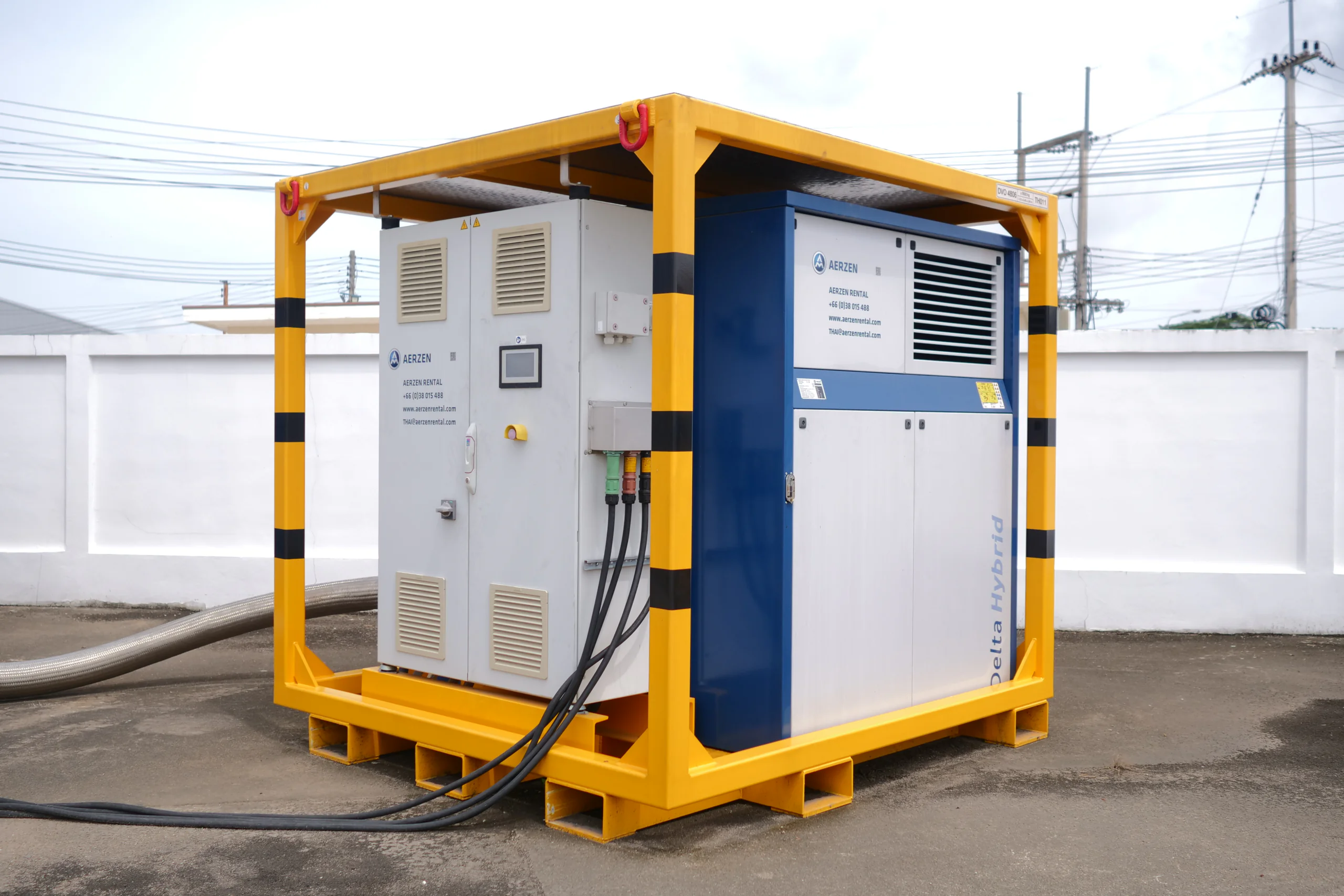 Operator Competency Matrix เครื่องเช่า Blower Compressor | AERZEN 1 AERZEN Delta Hybrid blower มุมมองด้านหลังแสดงจุดต่อท่อที่ depot กลางแจ้ง — AERZEN Rental Thailand
