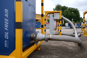 Blog 1 AERZEN oil-free blower discharge outlet and hose connection at outdoor depot — ISO 8573-1 Class 0