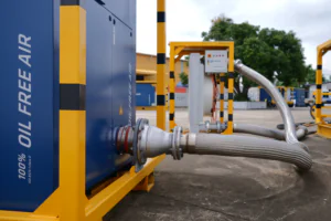 Blog 7 AERZEN oil-free blower discharge outlet and hose connection at outdoor depot — ISO 8573-1 Class 0